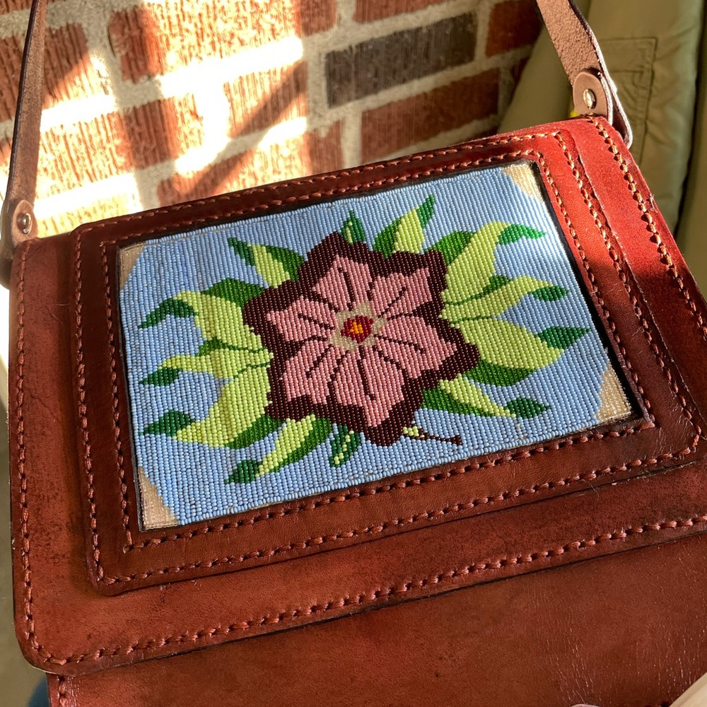 Beaded leather handbag